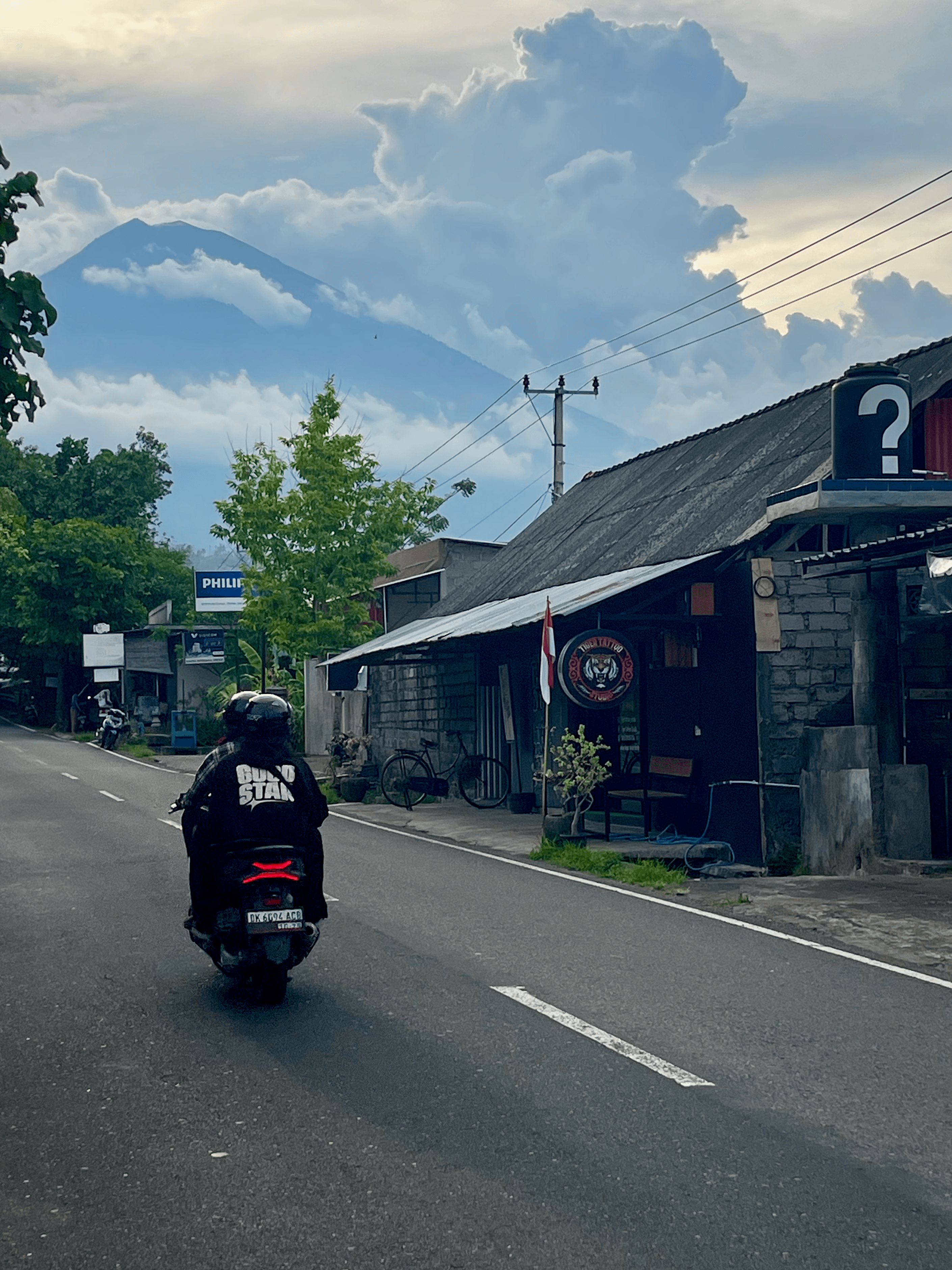 Mount Agung in the background of a road in Bali, Indonesia