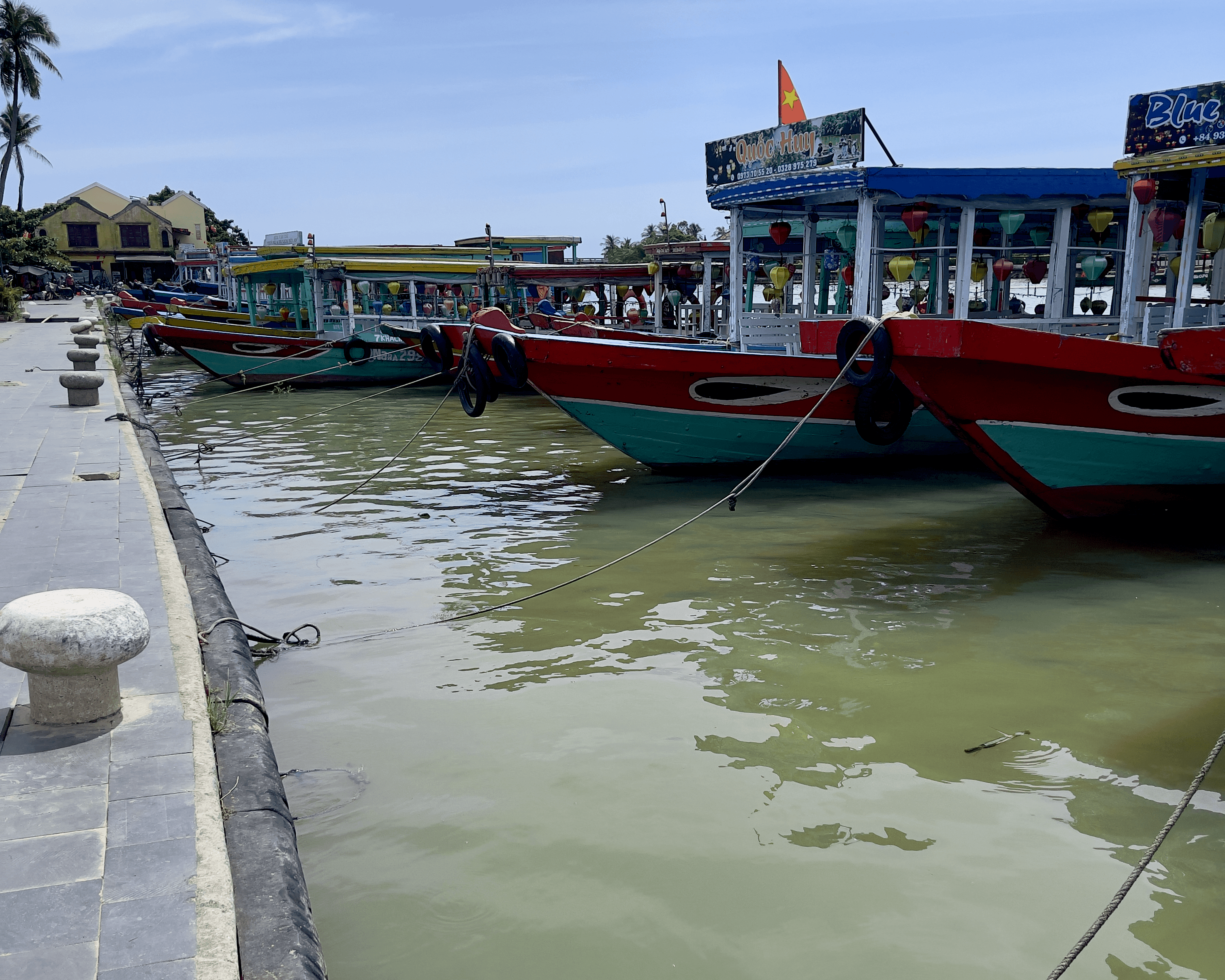 Colorful boats on a river in Hoi An, Vietnam