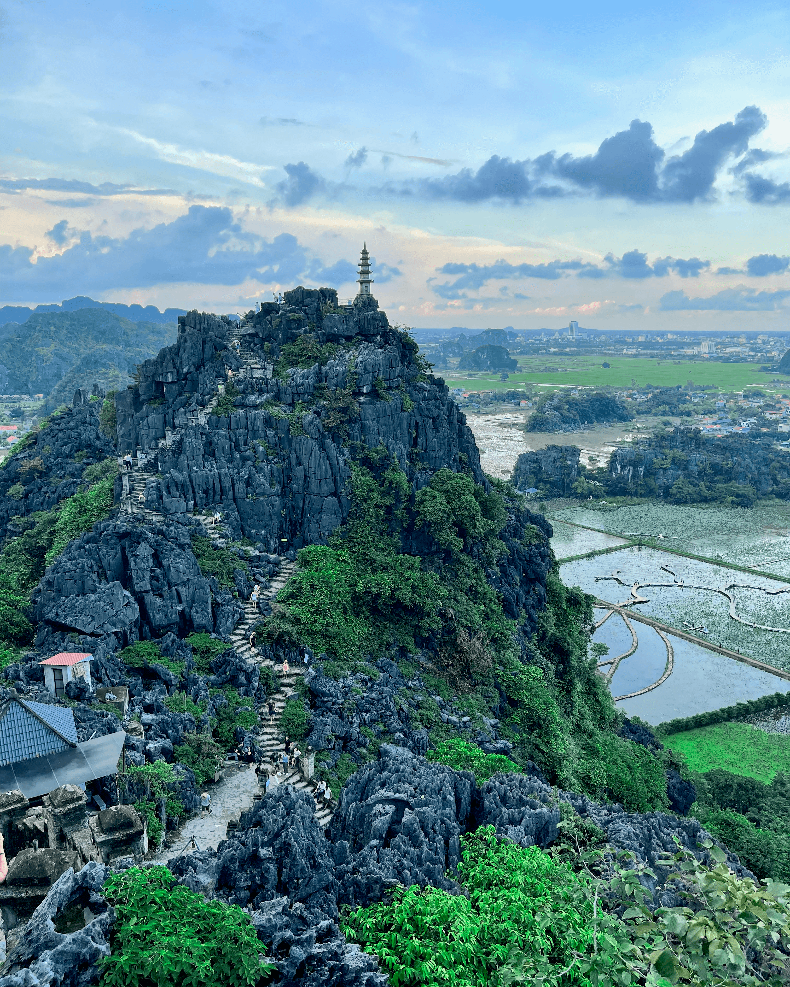 Hoa Lư Pagoda with water and trees in Ninh Binh, Vietnam