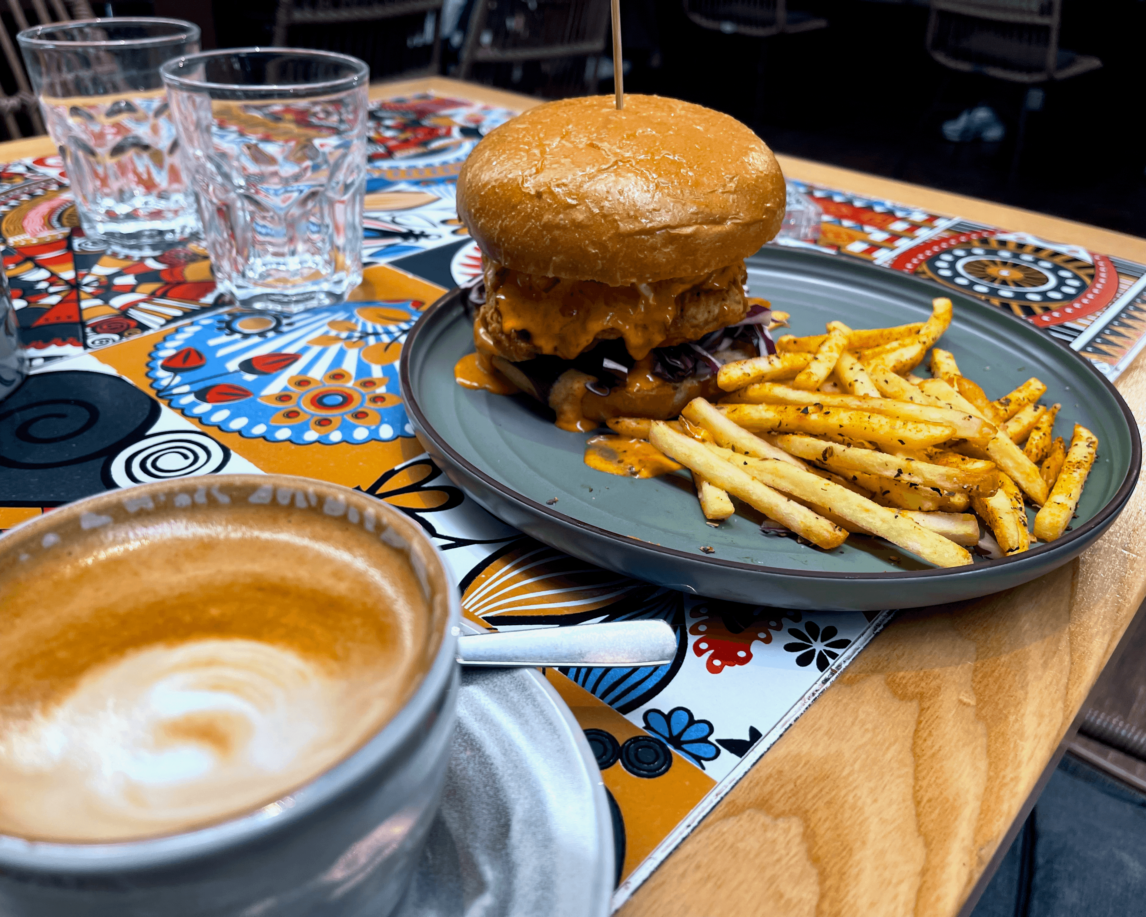 Cappuccino and chicken burger with fries from Kuala Lumpur, Malaysia