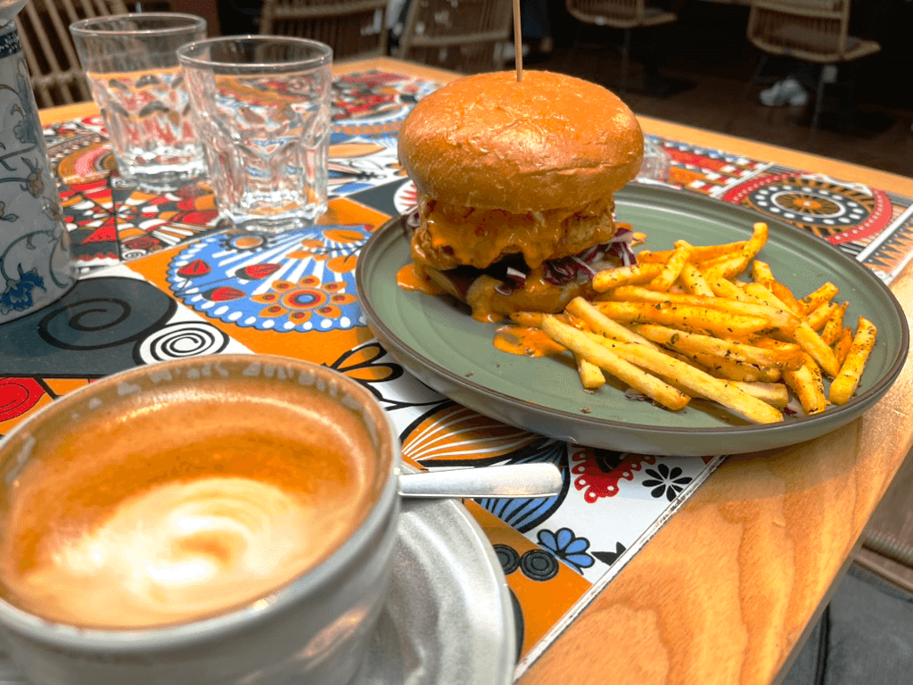 Cappuccino and chicken burger with fries from Kuala Lumpur, Malaysia