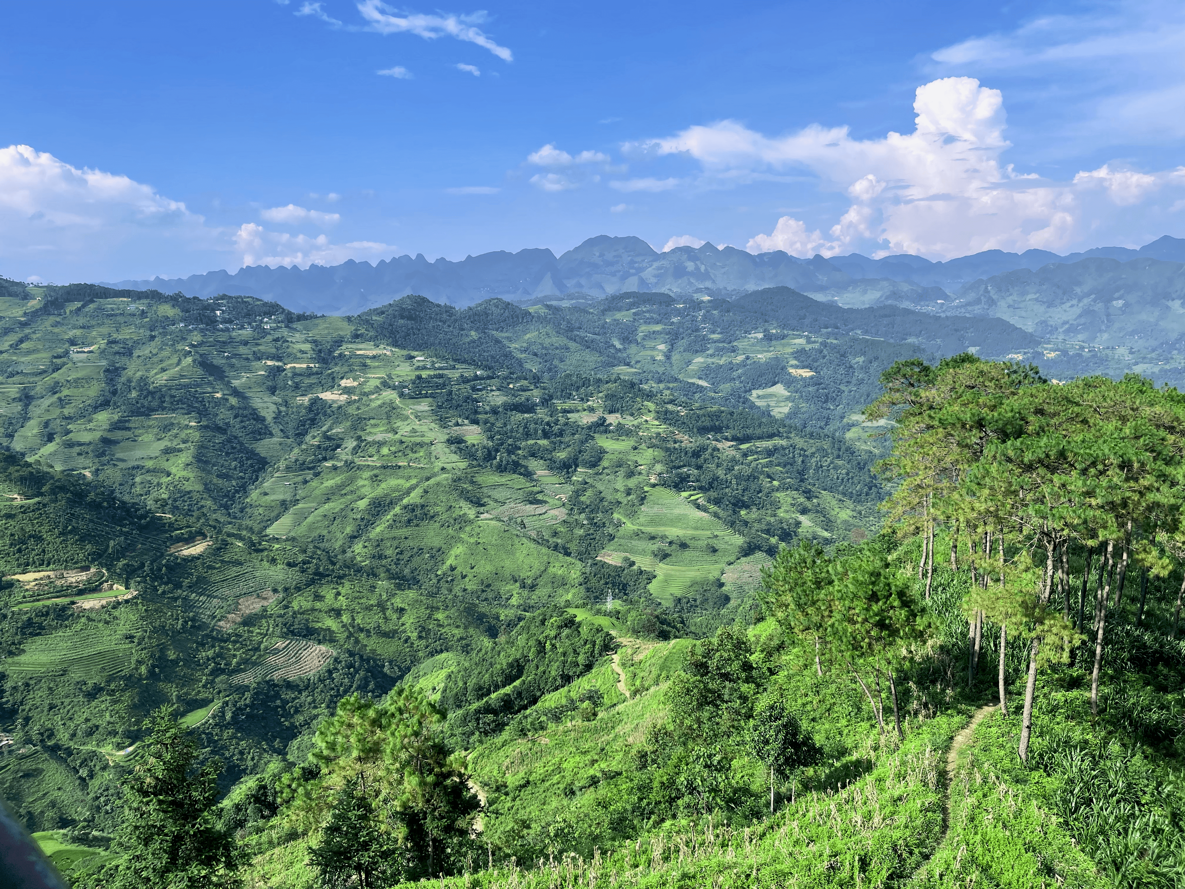 Blue sky and rolling mountains in Ha Giang, Vietnam