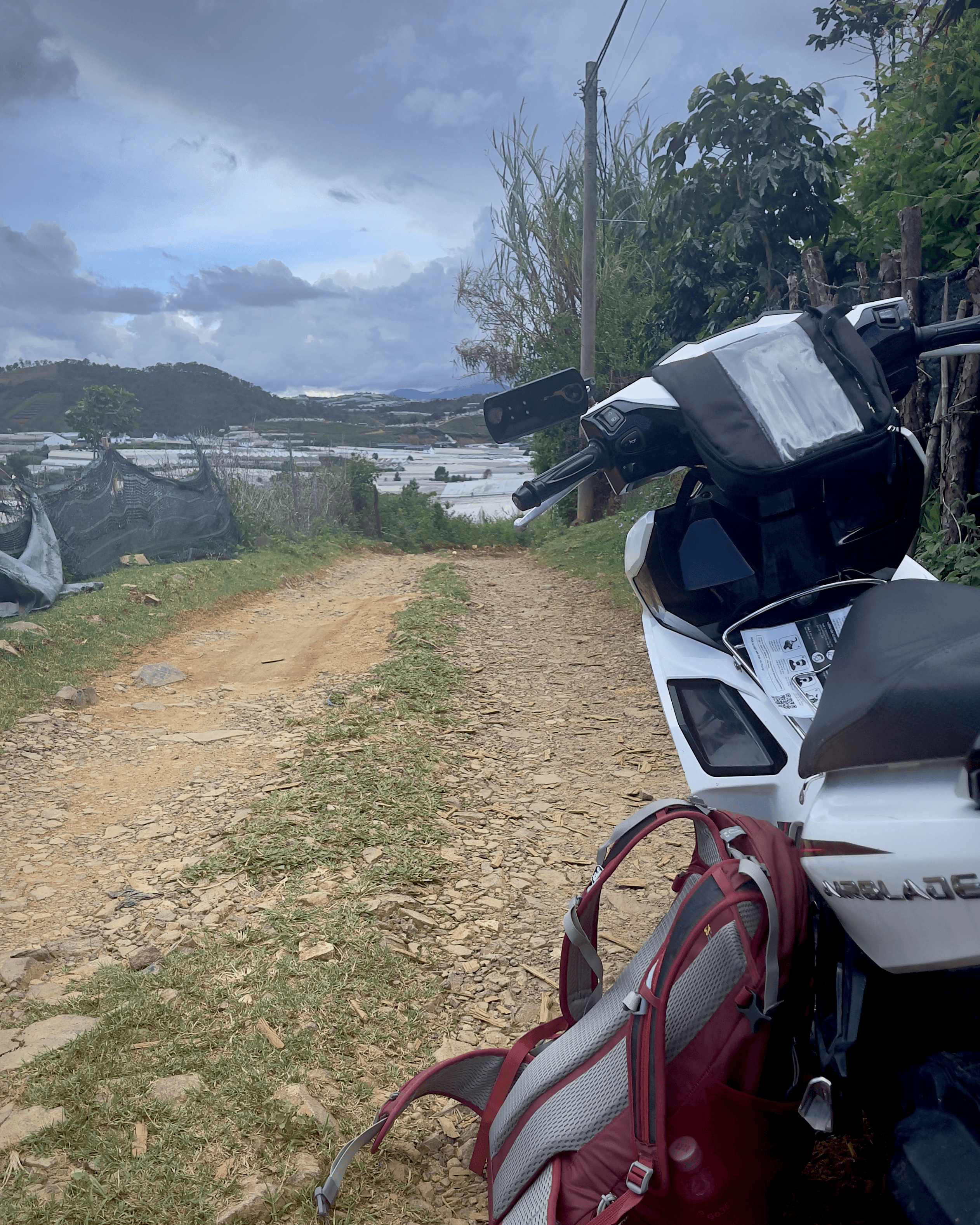 Motorbike and backpack on a mountain in Da Lat, Vietnam